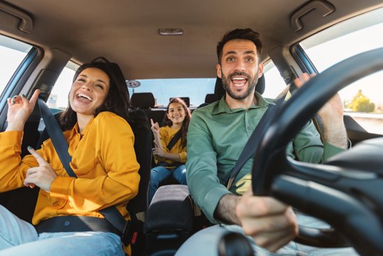 Family singing in the car