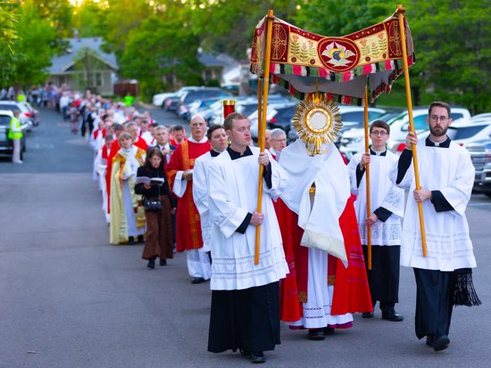 In this file photo from 2022, a Eucharistic procession starting from Holy Spirit in St. Paul to nearby Cretin-Derham Hall high school June 5 marks the beginning of the Archdiocesan Synod Assembly.