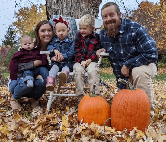 Corey Manning, newly appointed director of the Archdiocese of St. Paul and Minneapolis’ Office of Marriage, Family and Youth, with his wife, Alysa, and their three children, from left, Joseph 1, Clare, 2, and Malachi, 6, on Oct. 23, 2023.