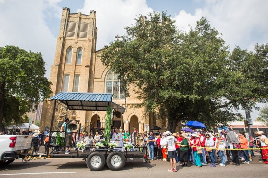The Eucharist sits on display in front of Sacred Heart Mission in Brownsville, Texas, in the back of a trailer used for delivering the word to remote areas as part of a Eucharistic procession to kickoff the St. Juan Diego Route of the National Eucharistic Pilgrimage May 19.