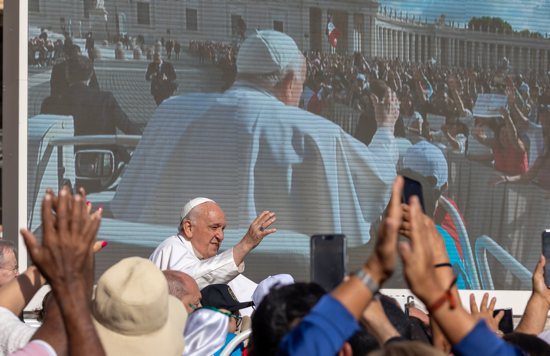 Pope Francis arrives in St. Peter's Square on the popemobile before his general audience at the Vatican May 22, 2024.