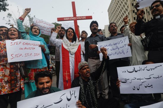 Members of the Christian community chant slogans as they hold placards during a protest in Karachi, Pakistan, Aug. 17, 2023, to condemn attacks on churches and houses in Jaranwala town in the Faisalabad district. A Muslim crowd vandalized churches and torched homes Aug. 16 after two Christians were accused of blasphemy.