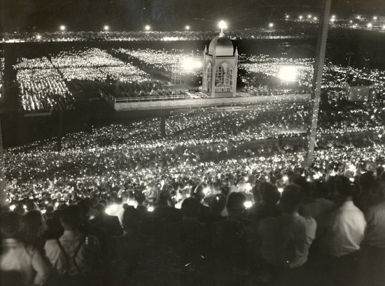 A candlelit crowd at midnight Mass during the 1941 National Eucharistic Congress at the Minnesota State Fairgrounds in St. Paul.