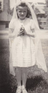 Rosemary Hayes, having made her first Communion.