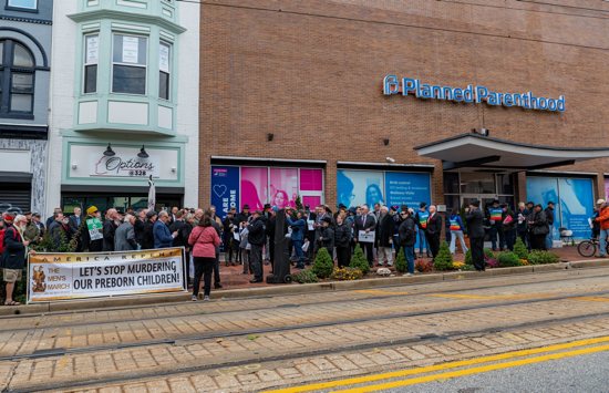 Men from around the country gather outside a Planned Parenthood facility in Baltimore Nov. 15, 2021, for the start of the National Men's March to End Abortion. Baltimore City police confirmed that after more than a year they have made an arrest in a brutal assault of two elderly Catholic pro-life activists that took place May 26, 2023, outside the doors of the center.