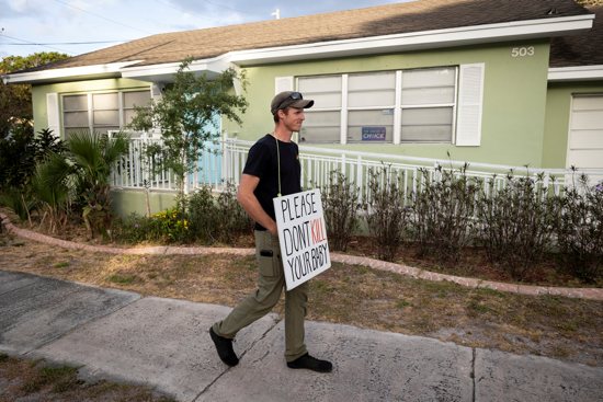 A pro-life activist demonstrates outside an abortion clinic in Fort Pierce, Fla., April 27, 2024.