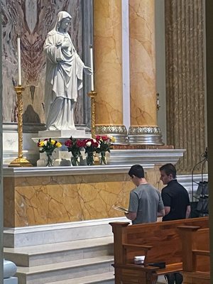Aiden Nicholas, left, and Patrick Storms recite a prayer of consecration to the Virgin Mary Aug. 7, in the Shrine Church at the Shrine of Our Lady of Guadalupe in La Crosse. 