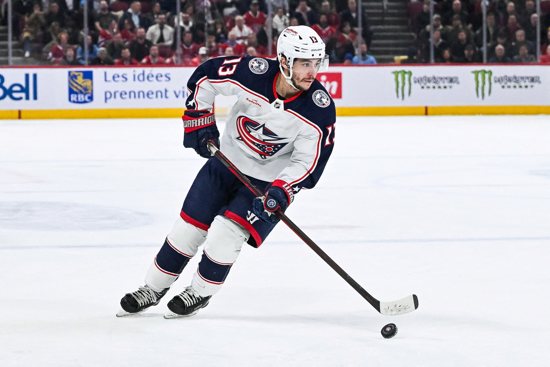Columbus Blue Jackets left wing Johnny Gaudreau (13) plays the puck against the Montreal Canadiens during the second period at Bell Centre in Montreal March 12, 2024. Gaudreau and his brother, Matthew, were killed the evening of Aug. 30, 2024, when they were struck by Sean M. Higgins of Woodstown, N.J., a suspected drunk driver, while bicycling in Oldmans Township, close to their hometown in Salem County, New Jersey State Police said. 
