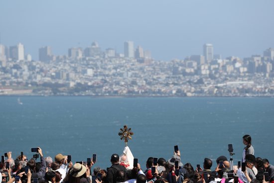 San Francisco Archbishop Salvatore J. Cordileone elevates the monstrance as he blesses the city and pilgrims after crossing the Golden Gate Bridge in San Francisco May 19, 2024. The National Eucharistic Congress Inc. announced Sept. 3, 2024, the launch of the Society of the Eucharistic Heart of Jesus to boost efforts for the ongoing National Eucharistic Revival.