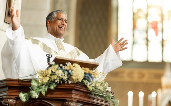 Priest preaching and teaching