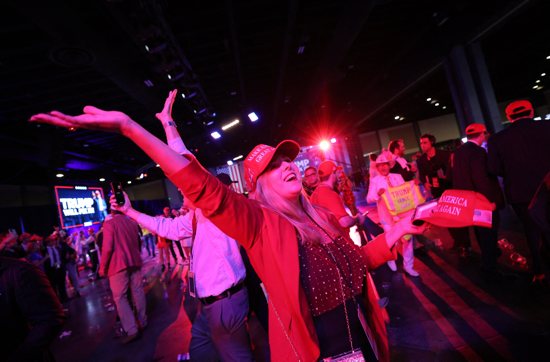 A supporter of Republican President-elect Donald Trump celebrates at his victory rally at the Palm Beach County Convention Center in West Palm Beach, Fla., Nov. 6, 2024, after Trump was elected the 47th president of the United States. The president of the U.S. Conference of Catholic Bishops, Archbishop Timothy P. Broglio of the U.S. Archdiocese for the Military Services, issued a statement Nov. 6, 2024, calling for prayer and unity following the results of the presidential election.