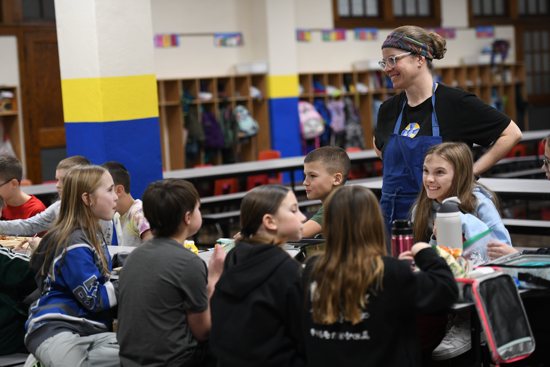 Stephanie Nix, head cook at St. Joseph School in St. Joseph, Minn., helps supervise the last lunch session when she finishes serving Jan. 23, 2025.