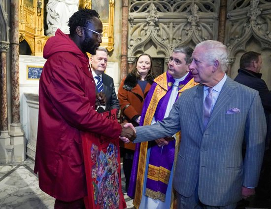Britain’s King Charles III greets a man after attending an Advent service celebrating the strength and courage of faith communities at the Church of the Immaculate Conception in London Dec. 17, 2024. The service was co-hosted by Aid to the Church in Need.