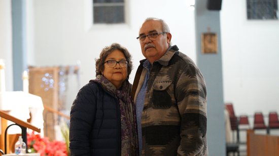 Deacon José Luis Díaz and his wife, Maria Esther, pose before a special Mass for fire victims and first responders at Mission San Gabriel In California Jan. 9, 2025. Deacon Díaz and three others saved Sacred Heart Church in Altadena from the Eaton Fire with only an iron pipe and a water hose Jan. 8.