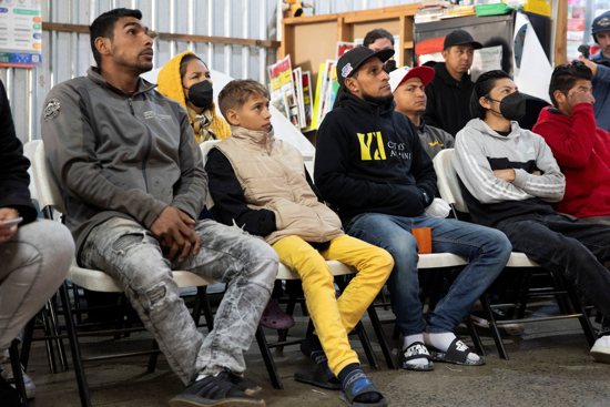 Migrants seeking asylum in the United States watch U.S. President Donald Trump's inauguration speech from the Juventud 2000 migrant shelter in Tijuana, Mexico, Jan. 20, 2025. They had previously requested an appointment with the U.S. Customs and Border Protection using the agency's CBP One smartphone application, which Trump has canceled.