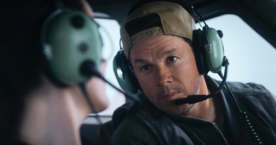 Michelle Dockery as Madolyn and Mark Wahlberg as Daryl in "Flight Risk" (Lionsgate). OSV News classification, A-III -- adults. Motion Picture Association rating, R -- restricted. Under 17 requires accompanying parent or adult guardian.