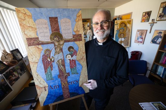 Father Perkl with his Icon of Mercy