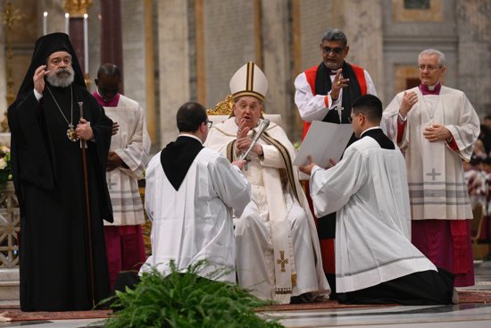 Pope Francis, Orthodox Metropolitan Polykarpos of Italy and Malta, left, and Anglican Archbishop Ian Ernest, director of the Anglican Center in Rome, right, give their blessing at the end of an ecumenical prayer service for the Week of Prayer for Christian Unity Jan. 25, 2025, at Rome's Basilica of St. Paul Outside the Walls.