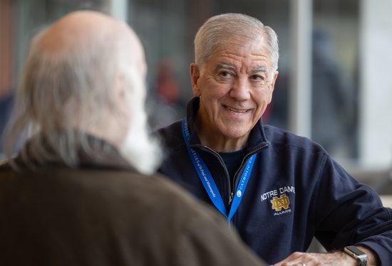 Jim Anderson, right, talks with James O’Brien at the St. Paul Opportunity Center, a daytime shelter located on the Catholic Charities Dorothy Day Place campus in downtown St. Paul.