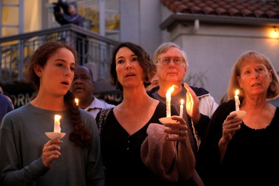 A candlelight vigil is held April 27, 2019, at Rancho Bernardo Community Presbyterian Church for victims of a shooting incident at the Congregation Chabad synagogue in Poway, Calif., near San Diego. 