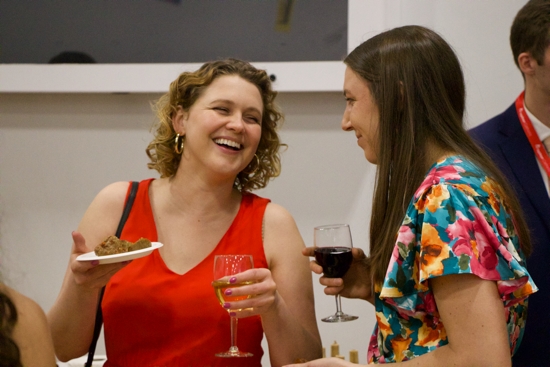 Monica Butler enjoys a laugh and a glass of wine while attending the Spring Wine Social. 