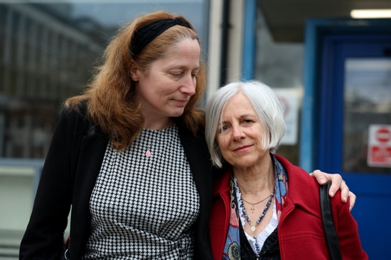British pro-life activist Livia Tossici-Bolt, right, charged with alleged breaching of a "buffer zone" outside Bournemouth clinic, is accompanied by Isabel Vaughan-Spruce of March For Life UK, outside Poole Magistrates' Court in Poole, England, April 4, 2025.