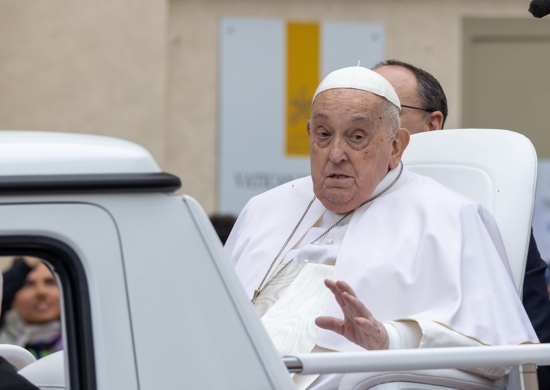 Pope Francis, in the popemobile, greets people in St. Peter's Square at the Vatican after giving his Easter blessing April 20, 2025. 