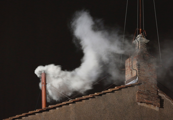 White smoke billows from the chimney of the Sistine Chapel March 13, 2013, at the Vatican. Argentine Cardinal Jorge Mario Bergoglio, now Pope Francis, was elected the 266th Roman Catholic pontiff. Details surrounding the pope's election and other events can be found in the Vatican's recently published annual report of activities in 2013. 