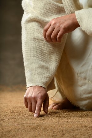 Jesus writing in the sand