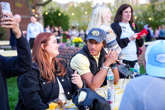 Samm Jones, left, and Ryan Satre, both 2016 graduates, reminisce May 3 at DeLaSalle High School’s 125th anniversary on-campus celebration on Nicollet Island in Minneapolis.