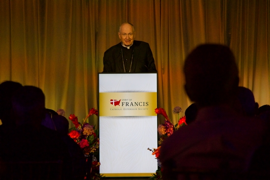 Bishop Emeritus Richard Pates talks to those gathered after receiving the award. 