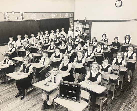 This photo shows the second-grade class of Robert Prevost, now Pope Leo XIV, at St. Mary of the Assumption School in Riverdale, Ill., in 1962. He is the fourth boy standing next to the blackboard. The Sisters of Christian Charity taught the future pope at the school.