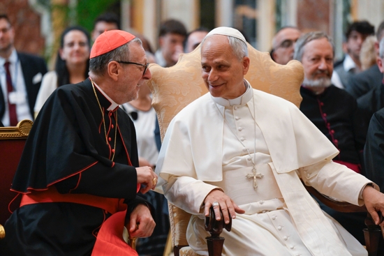 Pope Leo XIV speaks with Cardinal Claudio Gugerotti, prefect of the Dicastery for Eastern Churches, during an audience with members of ROACO, a Vatican coalition of Catholic charities at the Vatican June 26, 2025.