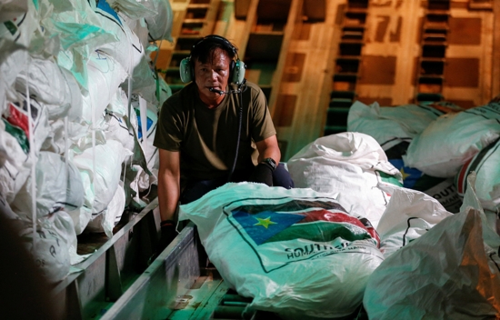 A worker prepares to release food aid from a cargo plane June 10, 2025, for the South Sudan town of Nasir, ravaged by fighting between local militiamen and the army. South Sudan is one of the countries the U.S. has been considering for the deportation of certain individuals, including those convicted of crimes, who may not be citizens of South Sudan.
