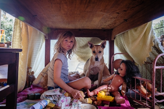 Lexi Venter stars in a scene from the movie "Don't Let's Go to the Dogs Tonight." The OSV News classification is A-III -- adults. The Motion Picture Association of America rating is R -- restricted. Under 17 requires accompanying parent or adult guardian.