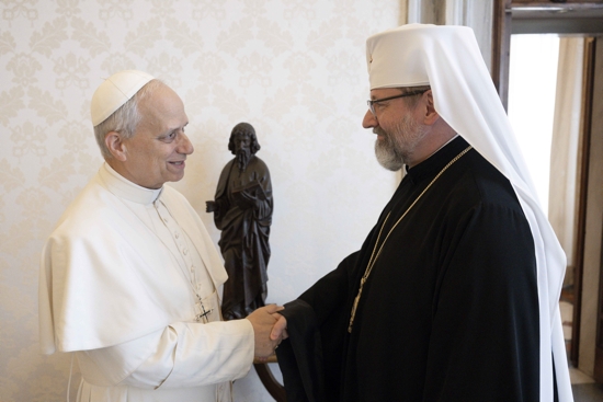 Pope Leo XIV greets Major Archbishop Sviatoslav Shevchuk of Kyiv-Halych, head of the Ukrainian Greek Catholic Church, in the library of the Apostolic Palace at the Vatican May 15, 2025.
