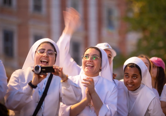 Religious sisters attend a concert in Risorgimento Square in Rome July 29, during the Jubilee of Digital Missionaries and Catholic Influencers. The evening celebration featured music and dancing following the day’s events at the Vatican. 