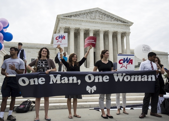Supporters of protecting the definition of marriage as the union of one man and one woman rally in front of the U.S. Supreme Court in Washington June 26, 2015, shortly before the justices handed down a 5-4 ruling that states must license same-sex marriages and must recognize same-sex marriages performed in other states.