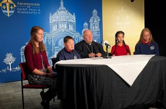 Archbishop Bernard prays a livestream rosary with a teacher and students from Holy Trinity Catholic School in South St. Paul.