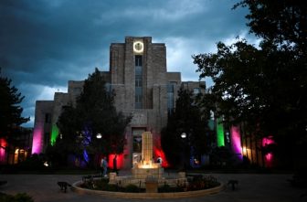 People walk past the Boulder County Courthouse in Colorado at dusk June 2, 2025, near the scene of an attack that injured multiple people. The alleged attacker, identified by the FBI as 45-year-old Mohamed Sabry Soliman, was armed with a homemade flamethrower and threw two Molotov cocktails at the group June 1, burning multiple victims, police said. Witnesses said Soliman yelled, "Free Palestine."