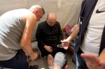 Parish priest of the Holy Family Parish, Father Gabriel Romanelli, receives medical attention, after he suffered light leg injuries following what initial reports said was an Israeli tank attack on the church, according to initial reports, at Al-Ahli Arab Hospital in Gaza City, in this still image taken from a video July 17, 2025.