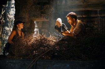 Scarlett Johansson as skilled covert operations expert Zora Bennett and Jonathan Bailey as paleontologist Dr. Henry Loomis, star in a scene from the movie "Jurassic World Rebirth.” The OSV News classification is A-III -- adults. The Motion Picture Association rating is PG-13 -- parents strongly cautioned. Some material may be inappropriate for children under 13. (OSV News photo/ Gareth Edwards, Universal)