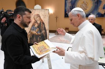 Pope Leo XIV receives a gift from Ukrainian President Volodymyr Zelenskyy during a meeting at the Vatican May 18, 2025.