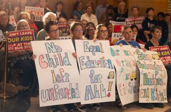 People gathered at the Minnesota State Capitol in St. Paul on May 7 hold signs showing their support for nonpublic education during an event called Rally and Advocacy Day. Nonpublic school pupil aid was protected in a June 9-10 special session. DAVE HRBACEK  |  THE CATHOLIC SPIRIT