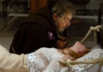 Al Pacino and Abigail Cowen star in a scene from the exorcism-themed movie "The Ritual."