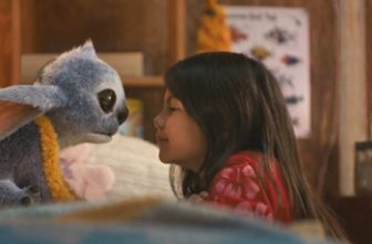 Animated character Stitch, voiced by Chris Sanders, and Maia Kealoha as Lilo are pictured in a scene from the movie "Lilo & Stitch." The OSV News classification is A-II -- adults and adolescents. The Motion Picture Association of America rating is PG -- parental guidance suggested. OSV News photo/Disney.
