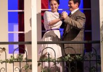 Diana and Chris Smith of St. Joseph in West St. Paul portray Ermengarde and her suiter, Andrew Kemper, in the play “The Matchmaker” by Thornton Wilder during a dress rehearsal at St. Agnes School in St. Paul June 14.  DAVE HRBACEK  |  THE CATHOLIC SPIRIT