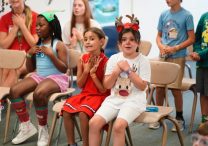 Children participate in a music class during summer faith camp at St. Patrick Parish in Bay Shore, N.Y., July 9, 2025. The theme for the day's activities was "Christmas in July."