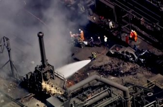 Firefighters spray water on the site of an explosion at US Steel's Clairton Coke Works plant in Clairton, Pa., Aug. 11, 2025, in this screengrab obtained from an aerial video.
