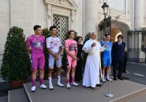 Pope Leo XIV greets cyclists participating in the Giro d’Italia before riding through the Vatican Gardens as part of the race’s passage through Rome June 1, 2025. He is joined by (from left to right): Mads Pedersen, leader of the points classification; Isaac Del Toro, best young rider; Simon Yates, leader of the general classification; Franciscan Sister of the Eucharist Raffaella Petrini, president of the office governing Vatican City State; Lorenzo Fortunato, leader in mountain climbing; and Urbano Cairo, president of di RCS MediaGroup, which owns the Italian sports newspaper, Gazzetta dello Sport. (professional cyclists)